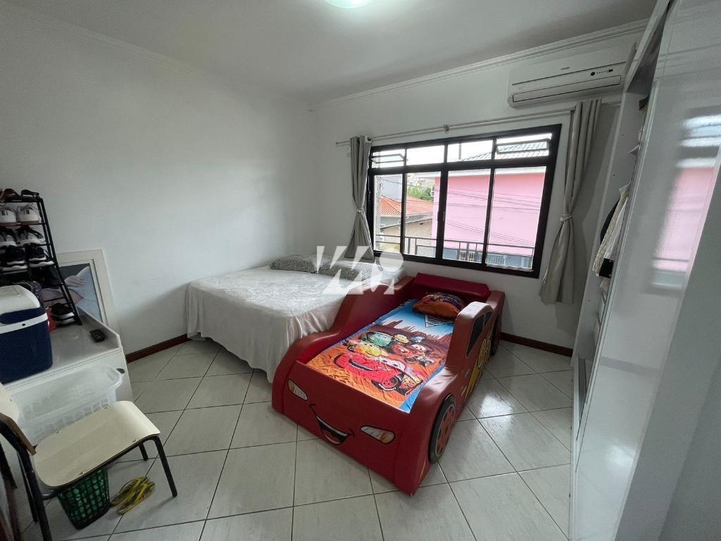 Casa em Ponte do Imaruim, Palhoça. 3 quartos, 115m². Imagem 13 de 14